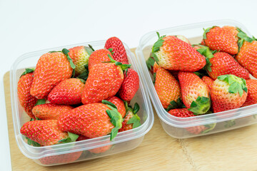 Fresh strawberries in the transparent box
