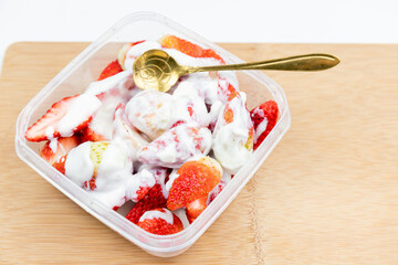 Yogurt mixed with strawberries