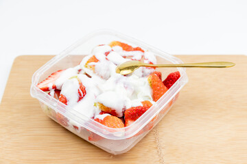 Yogurt mixed with strawberries