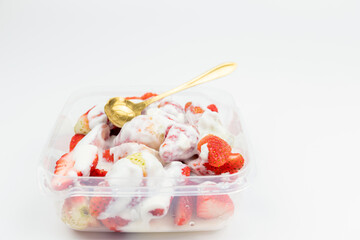 Yogurt mixed with strawberries