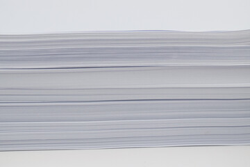 Stack of white papers.