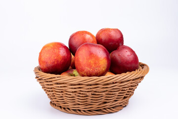 Fresh nectarine fruits in the fruit basket
