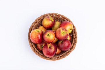 Fresh nectarine fruits in the fruit basket
