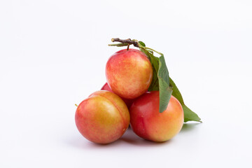 Four fresh red plums