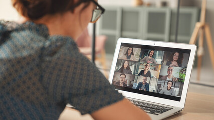 Young woman using computer for video call	