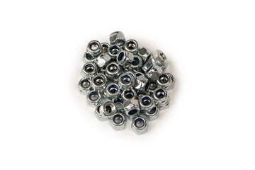 A group of metal nuts isolated on a white background.