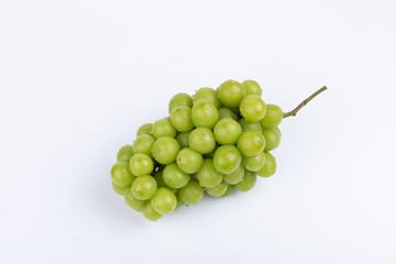 Sunburst rose grapes on a white background