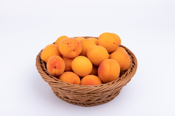 Fresh apricots in the fruit basket