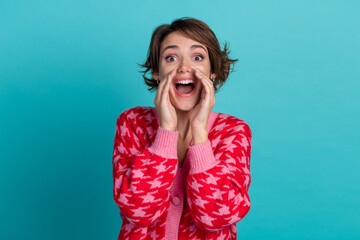 Photo of good mood positive lady wear pink cardigan arms mouth shouting anoouncement isolated teal...