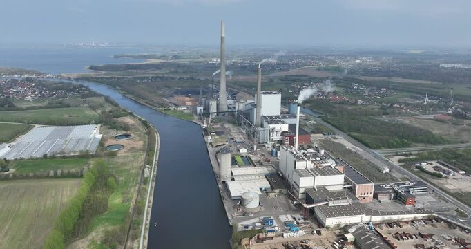 Power plant in Odense, Denmark, electricy generation, power and energy, Aerial drone view. Industrial site.