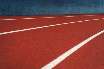  asphalt texture in the athletics stadium or road with white paint start text - forward.