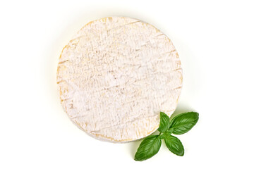 Whole Round Camembert Cheese with Basil Leaf Isolated on White Background.