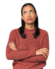 Young Filipina woman tired of a repetitive task.