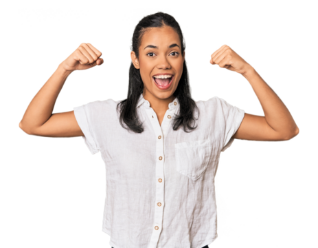 Young Filipina woman showing strength gesture with arms, symbol of feminine power