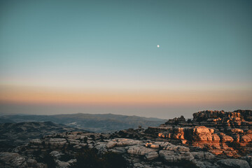 Moon over the ancient rocks