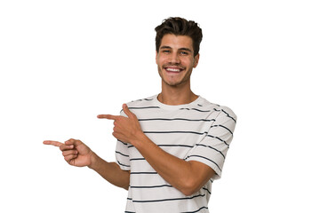 Young handsome caucasian man isolated on white background excited pointing with forefingers away.
