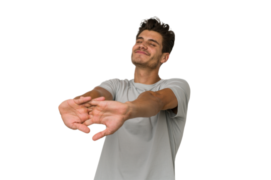 Young handsome caucasian man isolated on white background stretching arms, relaxed position.