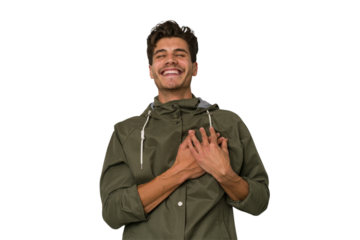 Young handsome caucasian man isolated on white background laughing keeping hands on heart, concept of happiness.