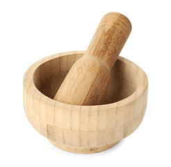 Wooden mortar with pestle isolated on white