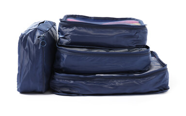 Fototapeta premium Blue packing cubes isolated on white. Storage organizer