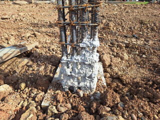 Cement fragments stuck to the building's structural steel columns.