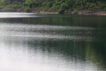 lakeshore and calm lake in the morning