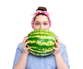 Surprised woman in striped shirt and pink headband holding a big watermelon, hiding half of her face, isolated on transparent background PNG.