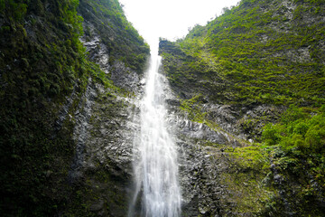 Fototapeta premium Hanakapi'ai falls on the beginning of the trek of the Na Pali coast on Kauai HI