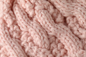 Texture of pink wool fabric as background, top view