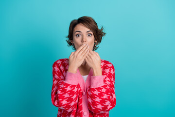 Photo portrait of lovely young lady cover mouth scared dressed stylish red garment isolated on...