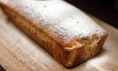 Large Loaf Cake Dusted with Powdered Sugar.