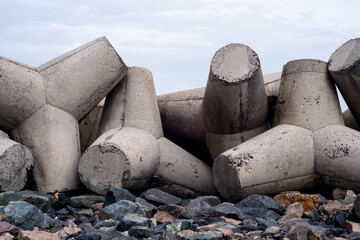 Bai da ong dia beach with tetrapods on the beach against the blue sky Mui Ne, Vietnam.
