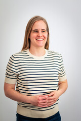 Obraz premium A visually impaired woman standing against white wall