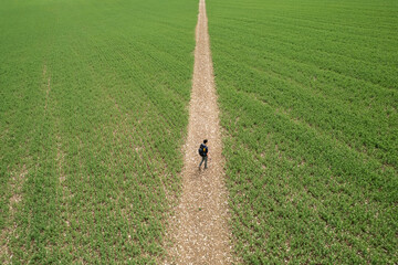 summer british outdoor landscape, backpacker walking on Combe, Kintbury, Berkshire, England.