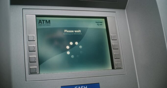Unrecognizable Person Entering PIN Code on ATM Keypad to Withdraw Money. Error Message on Cash Machine Display About Transaction Cancellation Due to Failed Authorization. Banking Equipment. Close Up.