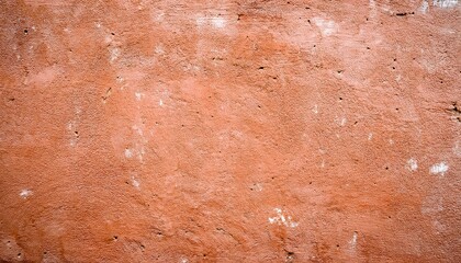 weathered terracotta plaster wall texture with peeling paint and white stains for vintage background, grunge branding, or rustic web design
