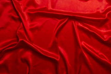The bright red satin fabric has beautiful waves, expressing love and emotion.
