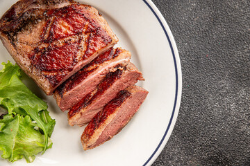 Duck breast roast meat poultry fresh delicious gourmet food background on the table rustic food top view copy space