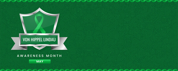 Von Hippel Lindau Awareness Month banner, with Green ribbon, shield and space for text. Design for Banner or Header.