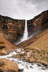 Powerful Hengifoss waterfall plunging into rocky canyon in East Iceland...