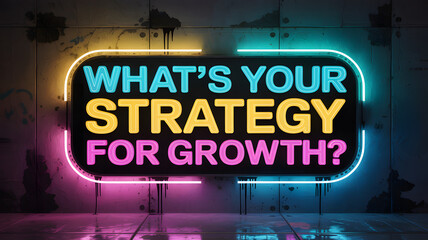 Neon wall sign with "WHAT&rsquo;S YOUR STRATEGY FOR GROWTH?" text in multicolor lights &ndash; digital business, vibrant strategy, visual branding

