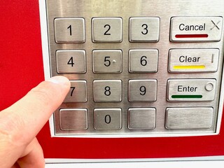 dial the code digits on the ATM
