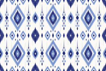 Seamless blue ikat background with geometric tribal look. Great for digital use, decor, and handmade-style graphics.
