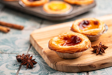 Traditional Portuguese custard tarts or Pastel de Nata freshly baked cream dessert. High quality photo