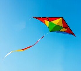 colorful kite flying in the blue sky, vibrant kite soaring against bright sky, cheerful kite in motion on sunny day