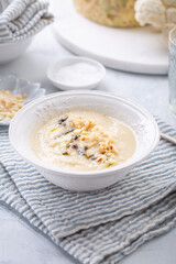 Vegetarian cauliflower soup with truffle and macademia nuts