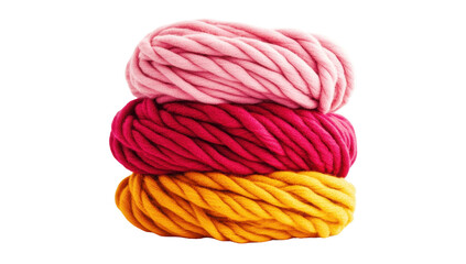 Three balls of chunky yarn stacked, showcasing shades of pink, crimson, and gold