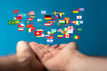 Image of many national flags interconnected, symbolizing global connection and collaboration.