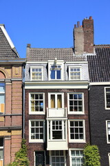 Amsterdam Canal House Facade with Big Chimneys Close Up, Netherlands