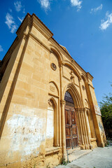 selective shot church facade under blue sky in the omorfo in cyprus